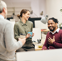 Employees talking and laughing.